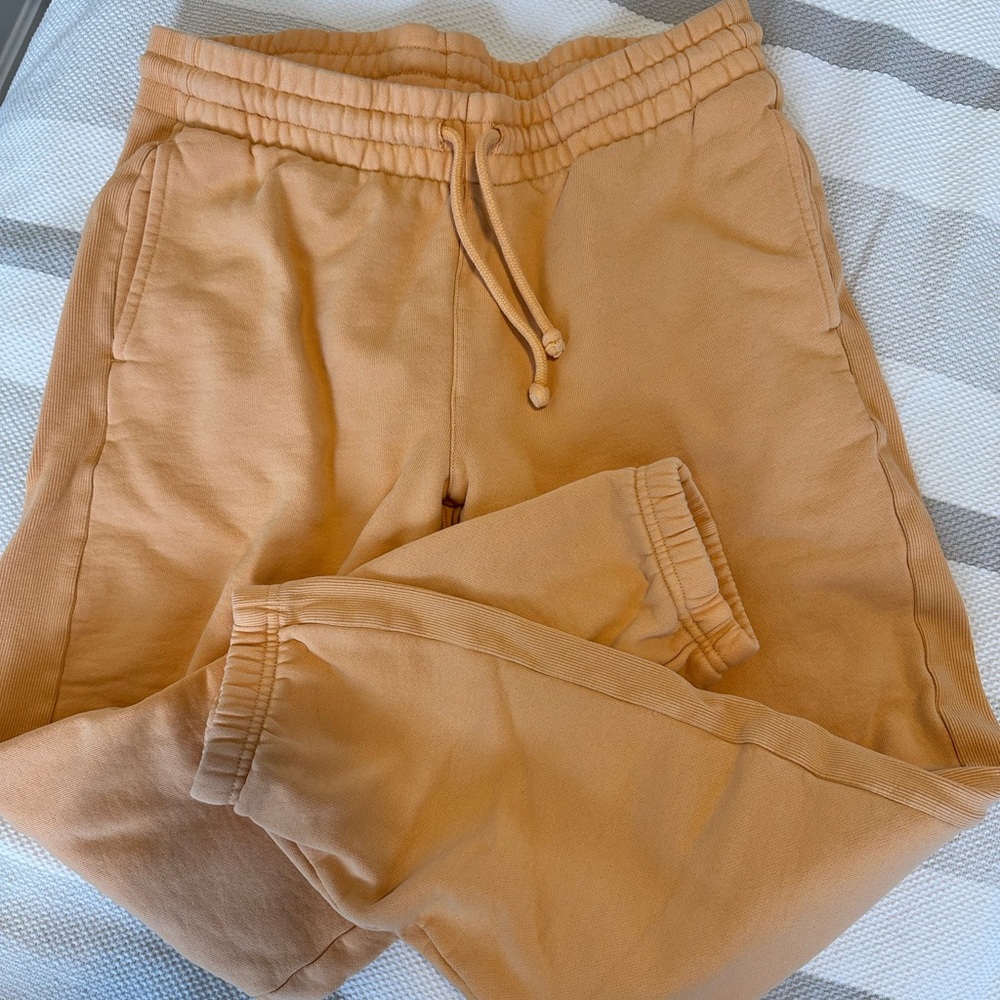 Aritzia boyfriend sweatpants orange